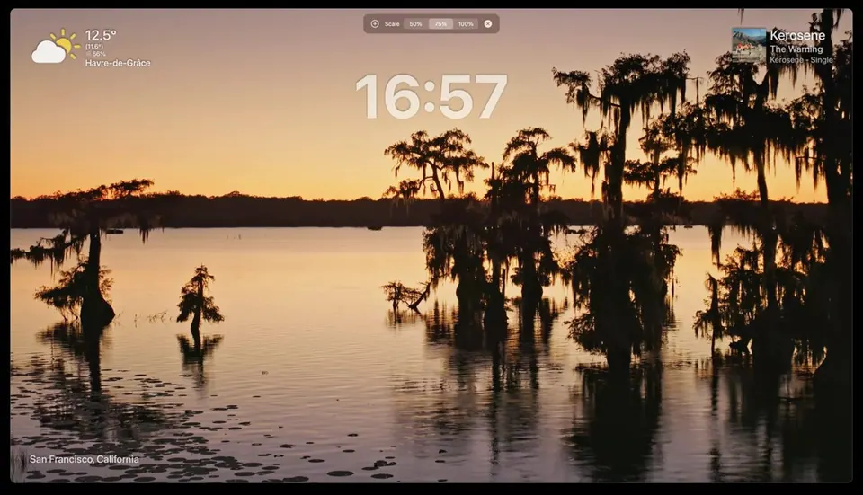 Aerial với lớp phủ thời tiết, đồng hồ và nhạc đang phát trên video hoàng hôn. (Ảnh: GitHub AerialScreensaver)